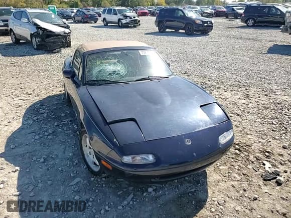 ✅ 1996 Mazda MX-5 Miata • VIN: JM1NA353XT0714259 • Lot: 75895284. Wystawiony na Copart z przebiegiem 94 653 mil. Bezpłatny archiwum sprzedaży aukcyjnych z USA i szczegółowy raport historii pojazdu na DreamBid. Zdjęcie 10.