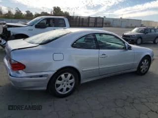 ✅ 2000 Mercedes-Benz CLK 320/430 • VIN: WDBLJ65G8YF122308 • Лот: 77449314. Опубликован ранее на Copart с пробегом 105 121 миль. Бесплатный доступ к архиву аукционных продаж из США и подробный отчёт об истории автомобиля на DreamBid. Изображение 3.