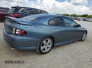 ✅ 2006 Pontiac GTO • VIN: 6G2VX12UX6L820107 • Lot: 74140014. Wystawiony na Copart z przebiegiem 39 449 mil. Bezpłatny archiwum sprzedaży aukcyjnych z USA i szczegółowy raport historii pojazdu na DreamBid. Zdjęcie 3.