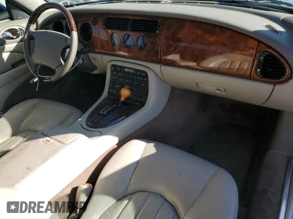 ✅ 2002 Jaguar XK • VIN: SAJDA42C82NA26174 • Лот: 82250765. Опубликован ранее на Copart с пробегом Не указан. Бесплатный доступ к архиву аукционных продаж из США и подробный отчёт об истории автомобиля на DreamBid. Изображение 8.