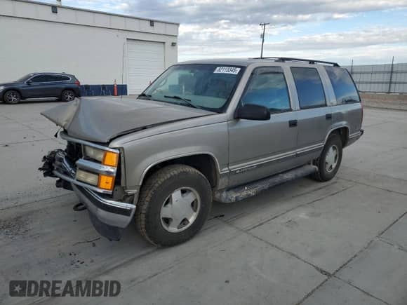 1999 Chevrolet Tahoe Z71 с VIN 1GNEK13R2XJ307813, выставлен на аукционе Copart как лот 82113345 с пробегом 240 647 миль миль и Списание • Salvage title. История ставок и продаж доступна на DreamBid. Изображение 1.
