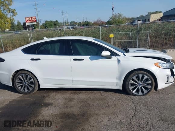 ✅ 2020 Ford Fusion SE • VIN: 3FA6P0T93LR247572 • Lot: 40481880. Listed on IAAI with 59,141 mi. Free auction sales archive from the USA and detailed vehicle history report at DreamBid. Image 13.