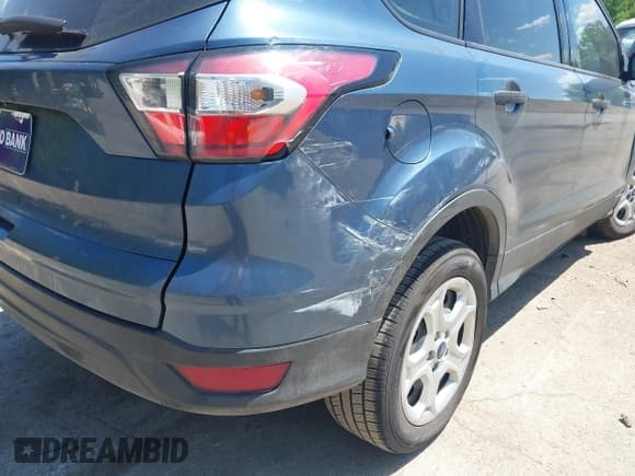 ✅ 2018 Ford Escape S • VIN: 1FMCU0F79JUA63979 • Lot: 42184819. Listed on IAAI with 125,720 mi. Free auction sales archive from the USA and detailed vehicle history report at DreamBid. Image 17.