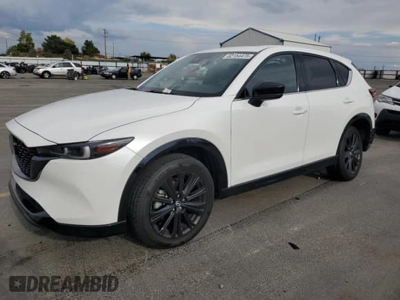 ✅ 2022 Mazda CX-5 2.5 Turbo • VIN: JM3KFBAY7N0619846 • Lot: 82154475. Wystawiony na Copart z przebiegiem 41 618 mil. Bezpłatny archiwum sprzedaży aukcyjnych z USA i szczegółowy raport historii pojazdu na DreamBid. Zdjęcie 1.