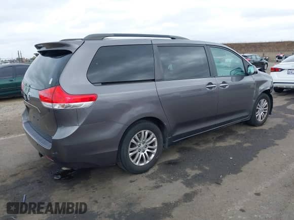 2011 Toyota Sienna XLE AAS with VIN 5TDYK3DC8BS059333, listed as a IAAI auction lot 43501915 with 173,775 mi miles and . Bid and sale history available at DreamBid. Image 4.