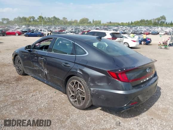 2021 Hyundai Sonata N Line with VIN 5NPEK4JC5MH108963, listed as a IAAI auction lot 43195113 with 101,460 mi miles and . Bid and sale history available at DreamBid. Image 3.