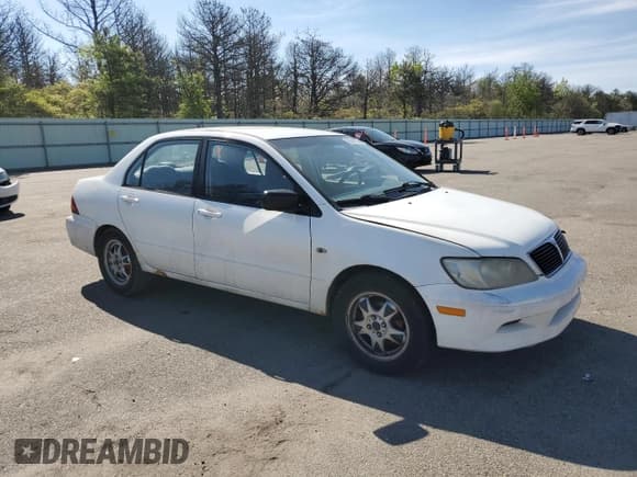 ✅ 2003 Mitsubishi Lancer ES • VIN: JA3AJ26E83U076335 • Лот: 67506825. Опубликован ранее на Copart с пробегом 143 394 миль. Бесплатный доступ к архиву аукционных продаж из США и подробный отчёт об истории автомобиля на DreamBid. Изображение 4.