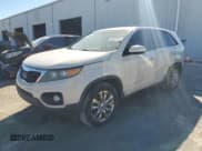 ✅ 2011 Kia Sorento EX • VIN: 5XYKU3A14BG021310 • Lot: 90604525. Listed on Copart with 221,607 mi. Free auction sales archive from the USA and detailed vehicle history report at DreamBid. Image 1.