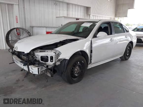 2014 Chevrolet Impala Police Police with VIN 2G1WD5E36E1133932, listed as a IAAI auction lot 42588380 with 174,405 mi miles and . Bid and sale history available at DreamBid. Image 2.