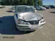 2005 Hyundai Elantra GLS z VIN KMHDN46D35U984289, wystawiony jako Copart lot #75179504 z przebiegiem 259 838 mil mil oraz Szkoda całkowita • Salvage title. Historia ofert i sprzedaży dostępna na DreamBid. Obrazek 10.