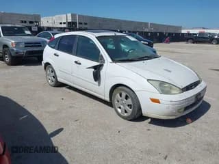 ✅ 2002 Ford Focus ZX5 • VIN: 3FAFP37322R228825 • Lot: 42702404. Wystawiony na IAAI z przebiegiem 127 963 mil. Bezpłatny archiwum sprzedaży aukcyjnych z USA i szczegółowy raport historii pojazdu na DreamBid. Zdjęcie 1.