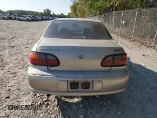 1998 Chevrolet Malibu LS z VIN 1G1NE52M3W6262601, wystawiony jako Copart lot #82218584 z przebiegiem Nie podano mil oraz Szkoda całkowita • Salvage title. Historia ofert i sprzedaży dostępna na DreamBid. Obrazek 6.