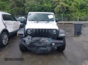 ✅ 2023 Jeep Wrangler • VIN: 1C4JJXN67PW630869 • Lot: 42170206. Wystawiony na IAAI z przebiegiem 56 384 mil. Bezpłatny archiwum sprzedaży aukcyjnych z USA i szczegółowy raport historii pojazdu na DreamBid. Zdjęcie 12.