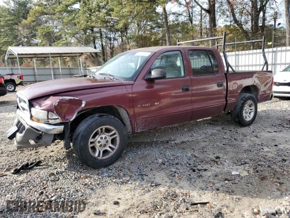 ✅ 2001 Dodge Dakota Sport • VIN: 1B7HL2AX21S313896 • Lot: 82873164. Wystawiony na Copart z przebiegiem 205 821 mil. Bezpłatny archiwum sprzedaży aukcyjnych z USA i szczegółowy raport historii pojazdu na DreamBid. Zdjęcie 1.