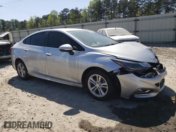 ✅ 2017 Chevrolet Cruze LT • VIN: 1G1BE5SM4H7263157 • Lot: 46839503. Listed on Copart with 90,330 mi. Free auction sales archive from the USA and detailed vehicle history report at DreamBid. Image 4.