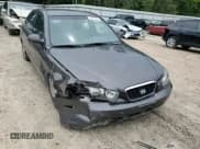 ✅ 2003 Hyundai Elantra GLS • VIN: KMHDN45D73U605258 • Lot: 61342875. Wystawiony na Copart z przebiegiem 61 440 mil. Bezpłatny archiwum sprzedaży aukcyjnych z USA i szczegółowy raport historii pojazdu na DreamBid. Zdjęcie 13.