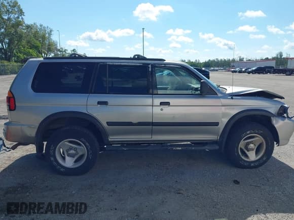✅ 2000 Mitsubishi Montero Sport LS • VIN: JA4LS31H2YP023984 • Лот: 43061870. Опубликован ранее на IAAI с пробегом 198 449 миль. Бесплатный доступ к архиву аукционных продаж из США и подробный отчёт об истории автомобиля на DreamBid. Изображение 13.