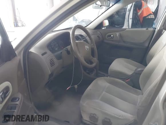 ✅ 2000 Mazda Protege DX • VIN: JM1BJ2221Y0239987 • Lot: 42092488. Listed on IAAI with 140,756 mi. Free auction sales archive from the USA and detailed vehicle history report at DreamBid. Image 5.