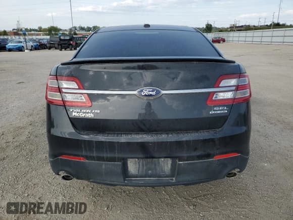 ✅ 2013 Ford Taurus SEL • VIN: 1FAHP2E88DG164656 • Лот: 84429605. Опубликован ранее на Copart с пробегом 186 907 миль. Бесплатный доступ к архиву аукционных продаж из США и подробный отчёт об истории автомобиля на DreamBid. Изображение 6.