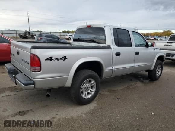 2004 Dodge Dakota Sport with VIN 1D7HG38N64S552747, listed as a Copart auction lot 77761074 with 170,868 mi miles and Clean title. Bid and sale history available at DreamBid. Image 3.