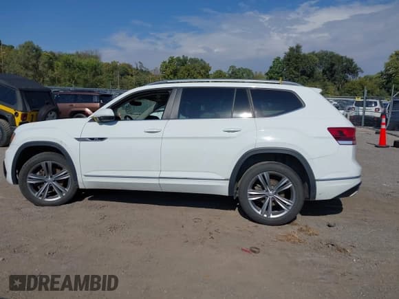 ✅ 2018 Volkswagen Atlas SE • VIN: 1V2PR2CA1JC595668 • Lot: 43434478. Listed on IAAI with 125,744 mi. Free auction sales archive from the USA and detailed vehicle history report at DreamBid. Image 14.