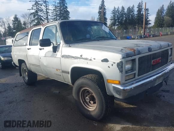 ✅ 1991 GMC Suburban • VIN: 1GKEV16K7MF512125 • Lot: 41634112. Wystawiony na IAAI z przebiegiem 256 640 mil. Bezpłatny archiwum sprzedaży aukcyjnych z USA i szczegółowy raport historii pojazdu na DreamBid. Zdjęcie 1.