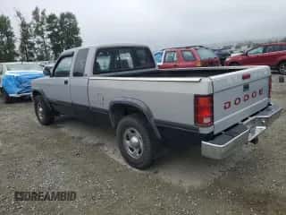 1994 Dodge Dakota z VIN 1B7GG23Y9RS590756, wystawiony jako Copart lot #66048685 z przebiegiem 127 408 mil mil oraz Szkoda całkowita • Salvage title. Historia ofert i sprzedaży dostępna na DreamBid. Obrazek 2.