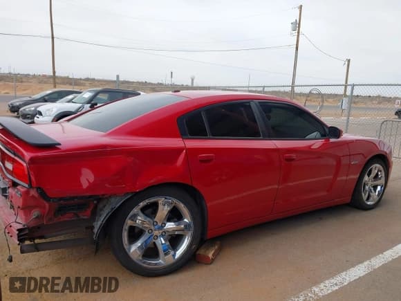 ✅ 2012 Dodge Charger Road/Track • VIN: 2C3CDXCT9CH303587 • Лот: 41896083. Опубликован ранее на IAAI с пробегом 122 080 миль. Бесплатный доступ к архиву аукционных продаж из США и подробный отчёт об истории автомобиля на DreamBid. Изображение 14.