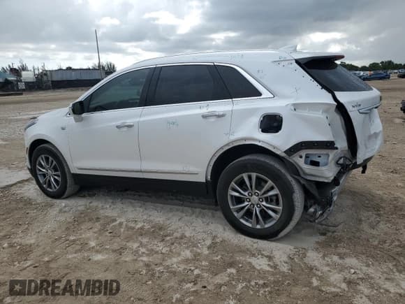 ✅ 2022 Cadillac XT5 FWD Premium Luxury • VIN: 1GYKNCRS0NZ175748 • Lot: 61651885. Listed on Copart with 13,747 mi. Free auction sales archive from the USA and detailed vehicle history report at DreamBid. Image 2.