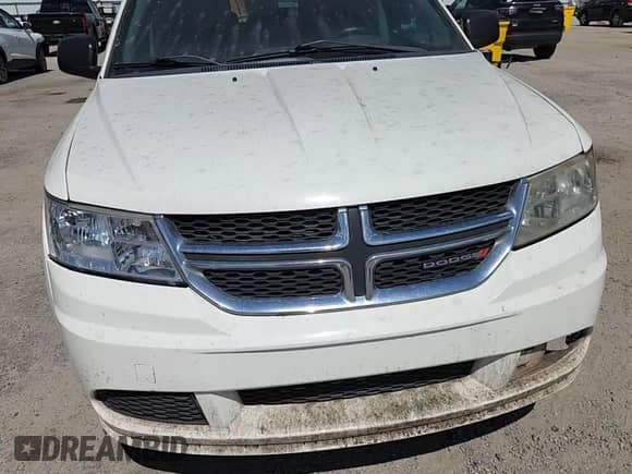 2012 Dodge Journey American Value z VIN 3C4PDCAB9CT353221, wystawiony jako Copart lot #83983955 z przebiegiem 312 681 mil mil oraz Szkoda całkowita • Salvage title. Historia ofert i sprzedaży dostępna na DreamBid. Obrazek 14.