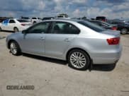 ✅ 2013 Volkswagen Jetta TDI w/Premium • VIN: 3VWLL7AJ4DM385387 • Lot: 63132695. Listed on Copart with 132,468 mi. Free auction sales archive from the USA and detailed vehicle history report at DreamBid. Image 2.