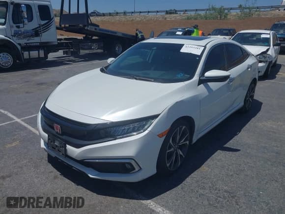 ✅ 2021 Honda Civic Touring • VIN: 19XFC1F95ME202228 • Lot: 42393281. Listed on IAAI with 83,868 mi. Free auction sales archive from the USA and detailed vehicle history report at DreamBid. Image 18.