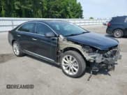 ✅ 2014 Cadillac XTS Luxury • VIN: 2G61M5S38E9132386 • Lot: 57744985. Listed on Copart with 130,940 mi. Free auction sales archive from the USA and detailed vehicle history report at DreamBid. Image 4.