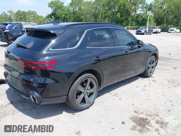✅ 2022 Genesis GV70 2.5T • VIN: KMUMADTB8NU050001 • Lot: 42687263. Listed on IAAI with 43,516 mi. Free auction sales archive from the USA and detailed vehicle history report at DreamBid. Image 4.