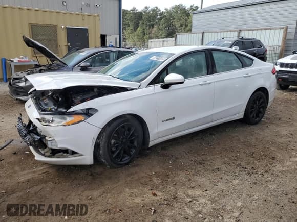 ✅ 2017 Ford Fusion Hybrid S • VIN: 3FA6P0UU0HR360678 • Lot: 85511465. Wystawiony na Copart z przebiegiem 104 755 mil. Bezpłatny archiwum sprzedaży aukcyjnych z USA i szczegółowy raport historii pojazdu na DreamBid. Zdjęcie 1.