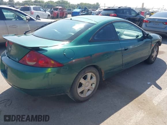 ✅ 2001 Mercury Cougar • VIN: 1ZWFT61L415625396 • Lot: 43137201. Wystawiony na IAAI z przebiegiem 211 851 mil. Bezpłatny archiwum sprzedaży aukcyjnych z USA i szczegółowy raport historii pojazdu na DreamBid. Zdjęcie 4.