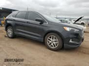 ✅ 2023 Ford Edge SEL • VIN: 2FMPK4J99PBA18773 • Лот: 82286925. Опубликован ранее на Copart с пробегом 59 077 миль. Бесплатный доступ к архиву аукционных продаж из США и подробный отчёт об истории автомобиля на DreamBid. Изображение 4.