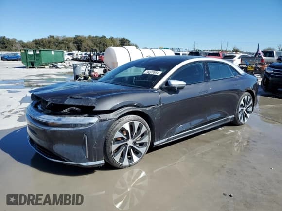 ✅ 2023 Lucid Air Grand Touring • VIN: 50EA1GBA1PA005532 • Lot: 76828684. Wystawiony na Copart z przebiegiem Nie podano. Bezpłatny archiwum sprzedaży aukcyjnych z USA i szczegółowy raport historii pojazdu na DreamBid. Zdjęcie 1.
