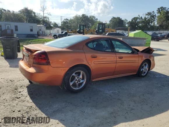 ✅ 2004 Pontiac Grand Prix GTP • VIN: 2G2WR524741134385 • Lot: 66844005. Listed on Copart with 167,819 mi. Free auction sales archive from the USA and detailed vehicle history report at DreamBid. Image 3.