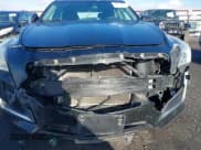 ✅ 2014 Cadillac CTS AWD • VIN: 1G6AW5SX1E0159081 • Lot: 43656547. Listed on IAAI with 105,828 mi. Free auction sales archive from the USA and detailed vehicle history report at DreamBid. Image 6.