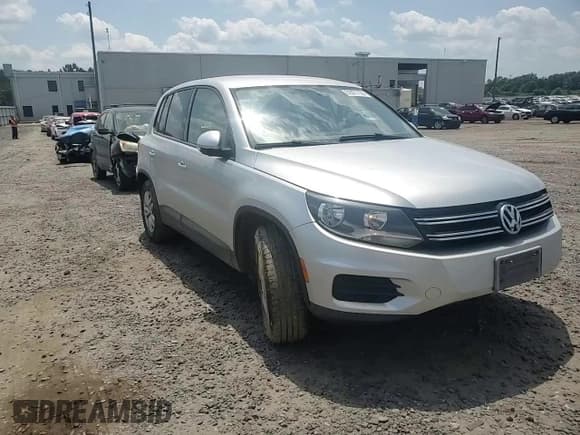 ✅ 2012 Volkswagen Tiguan LE • VIN: WVGAV7AX3CW577127 • Lot: 62021155. Listed on Copart with 103,605 mi. Free auction sales archive from the USA and detailed vehicle history report at DreamBid. Image 14.