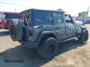 ✅ 2020 Jeep Wrangler Unlimited Sport • VIN: 1C4HJXDN4LW128581 • Lot: 42370273. Listed on IAAI with 79,688 mi. Free auction sales archive from the USA and detailed vehicle history report at DreamBid. Image 4.