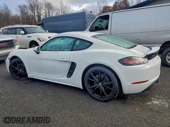 ✅ 2018 Porsche 718 Cayman • VIN: WP0AA2A81JK262696 • Lot: 94523435. Listed on Copart with 65,751 mi. Free auction sales archive from the USA and detailed vehicle history report at DreamBid. Image 2.