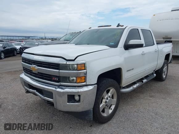 ✅ 2017 Chevrolet Silverado 2500HD LT • VIN: 1GC1KVEG6HF101957 • Lot: 42343984. Listed on IAAI with 313,934 mi. Free auction sales archive from the USA and detailed vehicle history report at DreamBid. Image 2.