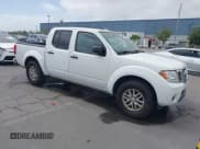 ✅ 2016 Nissan Frontier SV • VIN: 1N6AD0ER7GN737013 • Lot: 42106586. Listed on IAAI with 54,218 mi. Free auction sales archive from the USA and detailed vehicle history report at DreamBid. Image 1.