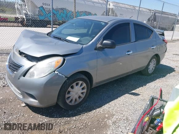 ✅ 2013 Nissan Versa SV • VIN: 3N1CN7APXDL894412 • Lot: 42005304. Listed on IAAI with 145,898 mi. Free auction sales archive from the USA and detailed vehicle history report at DreamBid. Image 2.