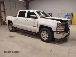2018 Chevrolet Silverado 1500 LT z VIN 3GCUKRECXJG313332, wystawiony jako IAAI lot #42474943 z przebiegiem 155 003 mil mil oraz . Historia ofert i sprzedaży dostępna na DreamBid. Obrazek 1.