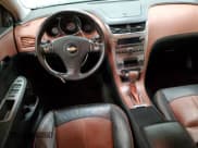 ✅ 2009 Chevrolet Malibu LTZ • VIN: 1G1ZK577594239950 • Lot: 76760084. Listed on Copart with 169,445 mi. Free auction sales archive from the USA and detailed vehicle history report at DreamBid. Image 8.