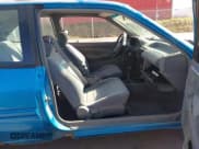 ✅ 1994 Ford Escort • VIN: 1FARP11J8RW336480 • Lot: 43582187. Listed on IAAI with 186,253 mi. Free auction sales archive from the USA and detailed vehicle history report at DreamBid. Image 5.