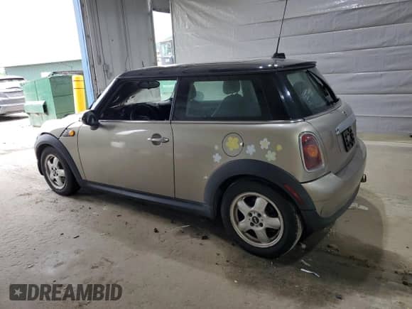 2010 MINI Hardtop with VIN WMWMF3C50ATZ66791, listed as a Copart auction lot 57592875 with Not provided miles and Salvage title. Bid and sale history available at DreamBid. Image 2.